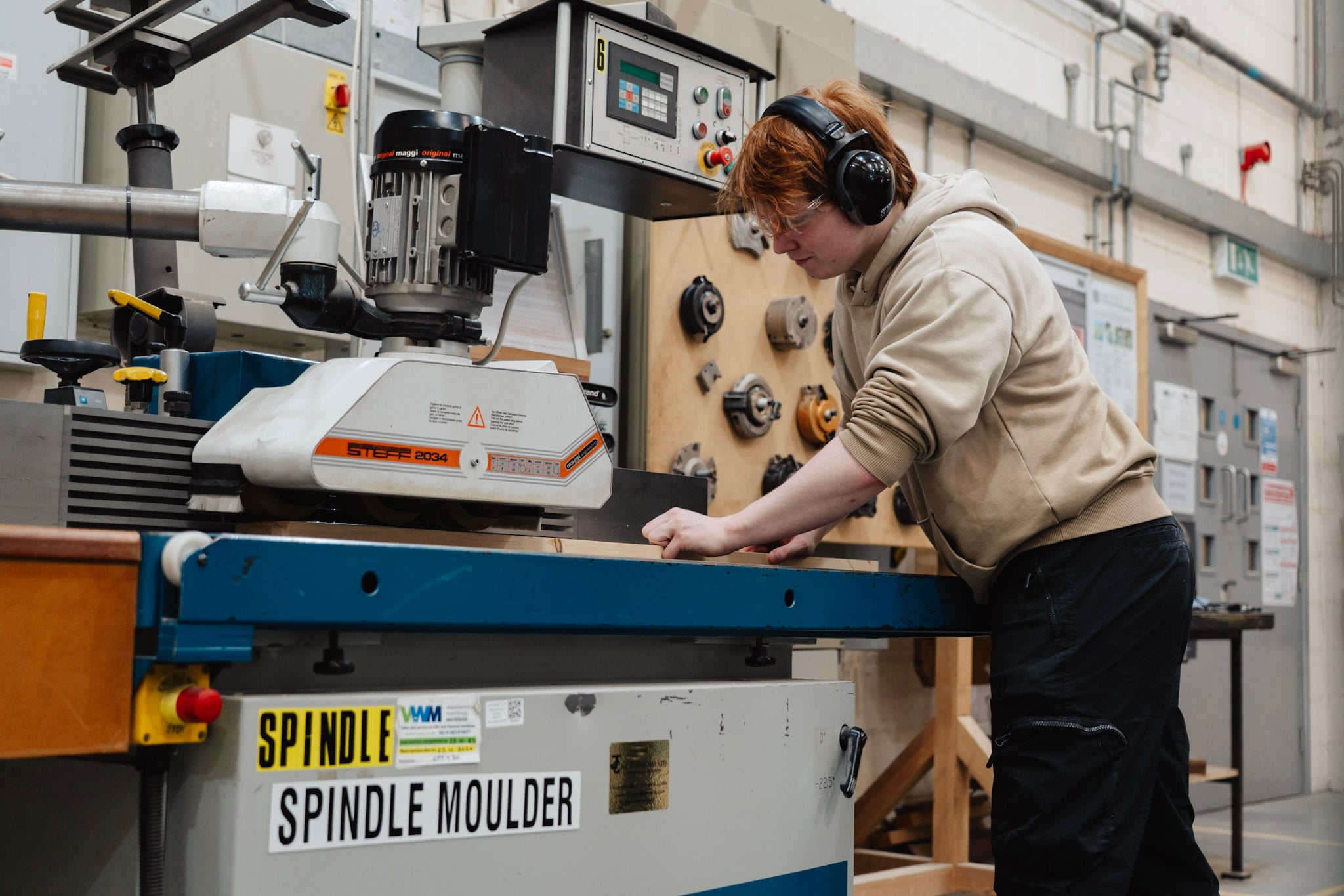 Student using woodwork machine