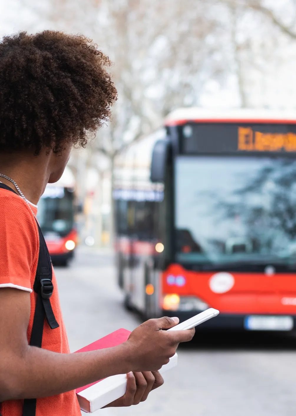 Boy waiting for the bus